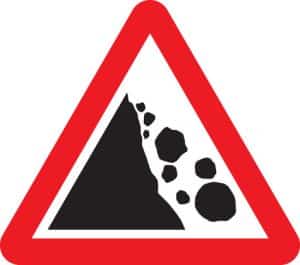 falling rocks road sign